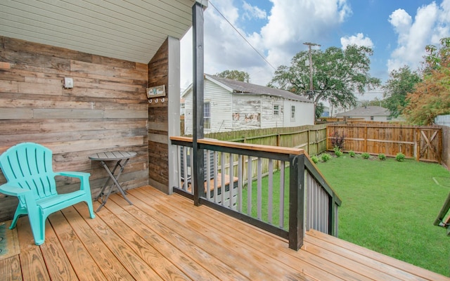 wooden deck with a yard