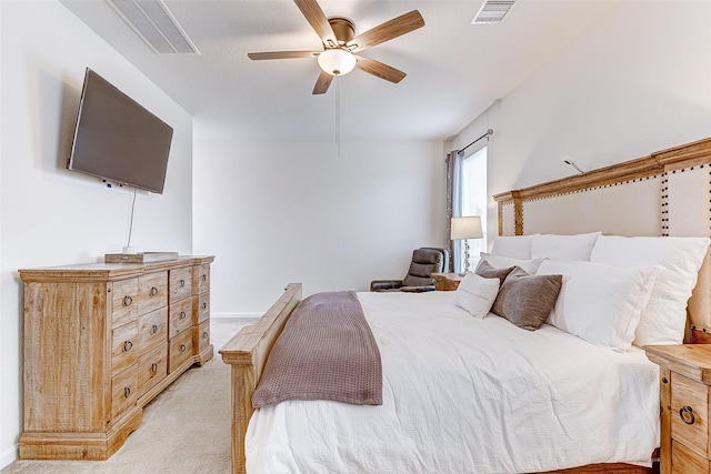 bedroom featuring light carpet and ceiling fan