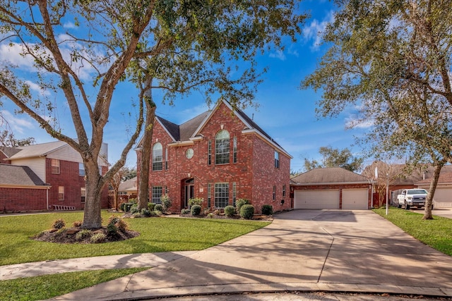 view of front of house featuring a garage and a front lawn