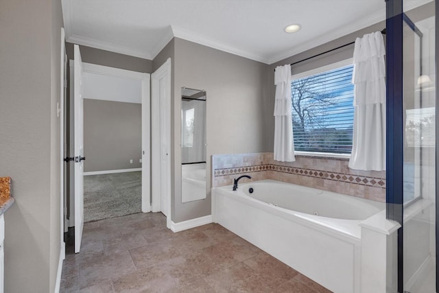 bathroom featuring crown molding and a bath