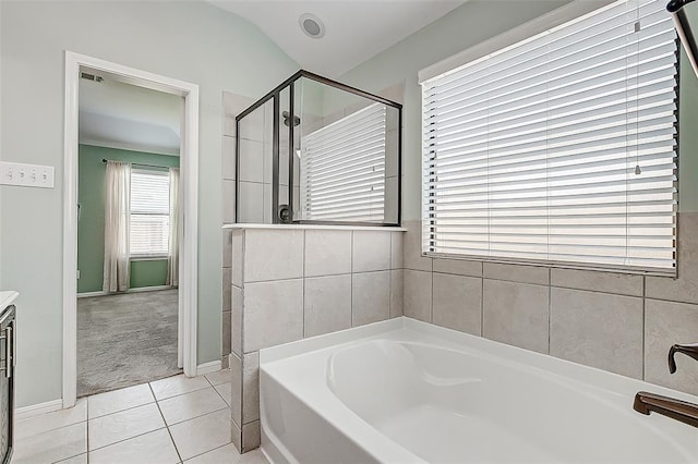 bathroom with plus walk in shower, tile patterned floors, and vanity