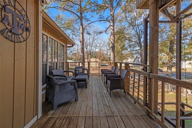 1382 Indian Hill Blvd, Livingston, TX 77351 - wooden deck featuring outdoor lounge area