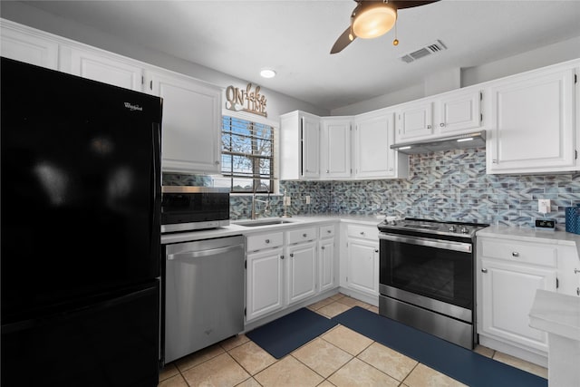 1382 Indian Hill Blvd, Livingston, TX 77351 - kitchen featuring light countertops, visible vents, a sink, light tile patterned flooring, and appliances with stainless steel finishes