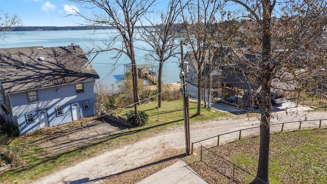 view of yard with a water view