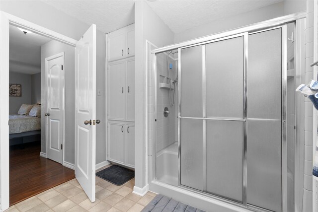 1382 Indian Hill Blvd, Livingston, TX 77351 - ensuite bathroom with a stall shower and ensuite bathroom