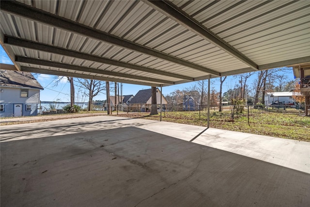 1382 Indian Hill Blvd, Livingston, TX 77351 - view of patio / terrace featuring fence, a carport, and driveway