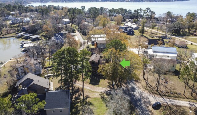 1382 Indian Hill Blvd, Livingston, TX 77351 - aerial view featuring a water view and a residential view