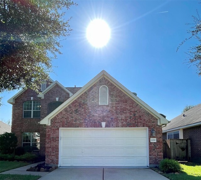 view of property featuring a garage