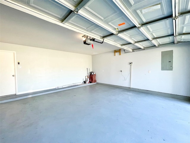 garage with electric panel, baseboards, and a garage door opener