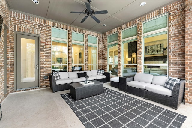 view of patio with ceiling fan and outdoor lounge area