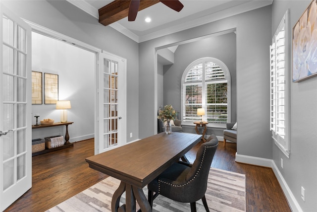 dining space featuring beam ceiling, crown molding, dark hardwood / wood-style flooring, and french doors