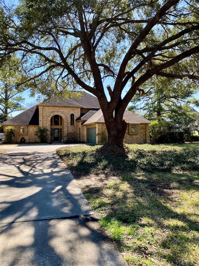 view of front of property with a garage