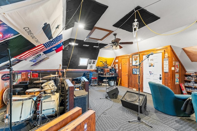 interior space featuring lofted ceiling and carpet flooring