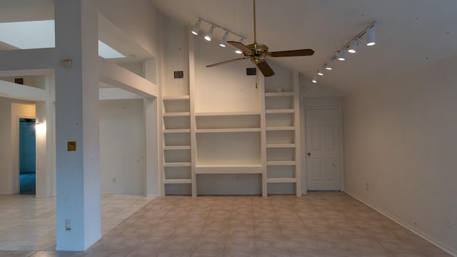 unfurnished living room with rail lighting, high vaulted ceiling, built in features, and ceiling fan