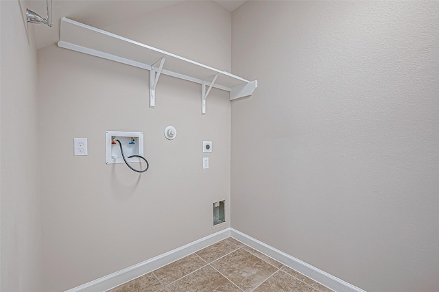 laundry room with electric dryer hookup, washer hookup, tile patterned flooring, and gas dryer hookup