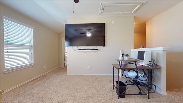 home office with ceiling fan and light colored carpet