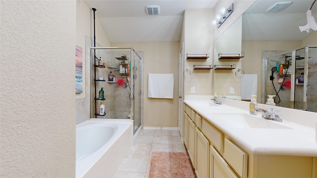 bathroom featuring vanity, tile patterned floors, and shower with separate bathtub