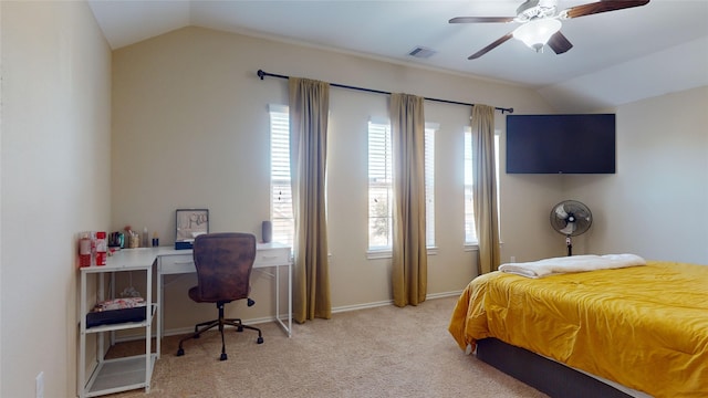 bedroom with lofted ceiling, light colored carpet, and ceiling fan