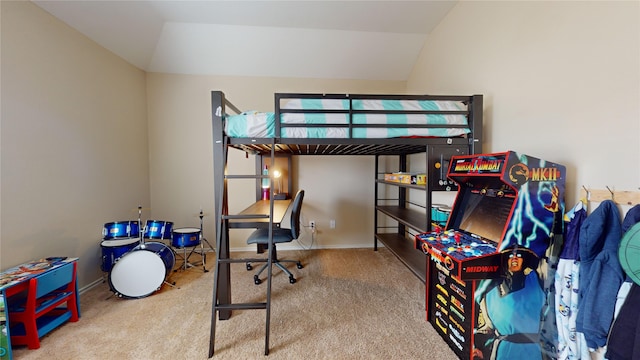 bedroom featuring carpet and lofted ceiling