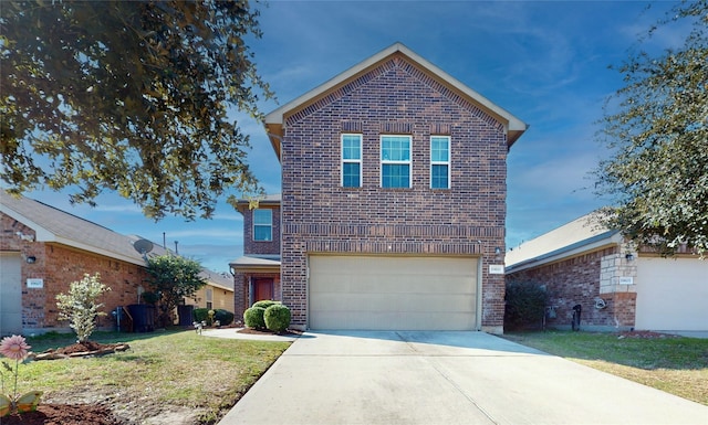 view of property featuring a garage and a front yard