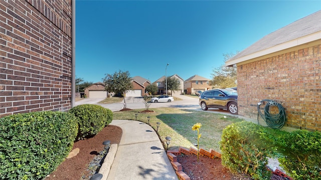 view of yard featuring a garage