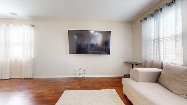 living room featuring hardwood / wood-style flooring and plenty of natural light