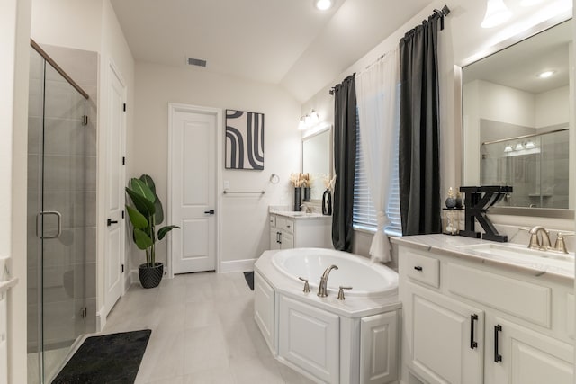 bathroom featuring vanity and plus walk in shower