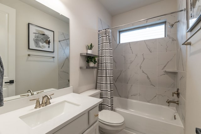 full bathroom with vanity, toilet, and shower / bath combo