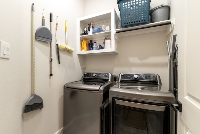 clothes washing area with independent washer and dryer