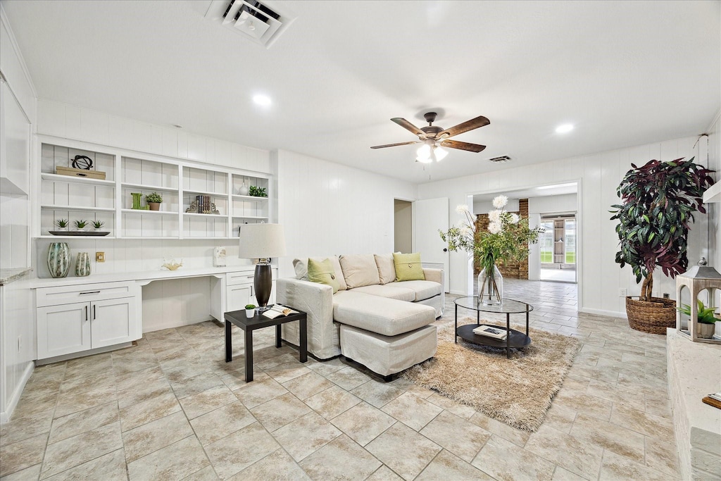 living room with ceiling fan