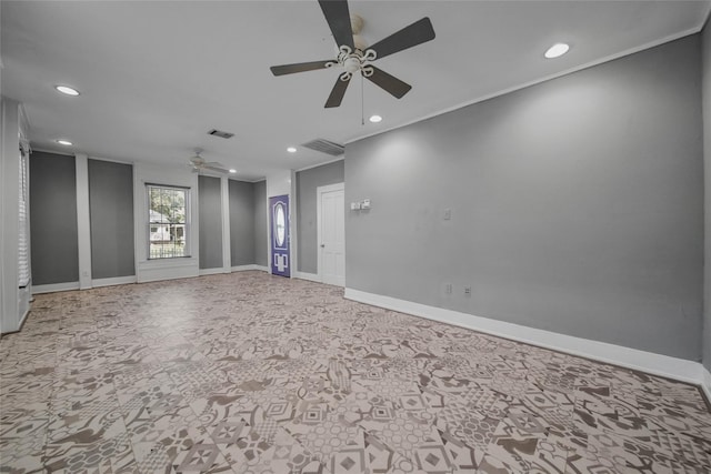 spare room with ceiling fan