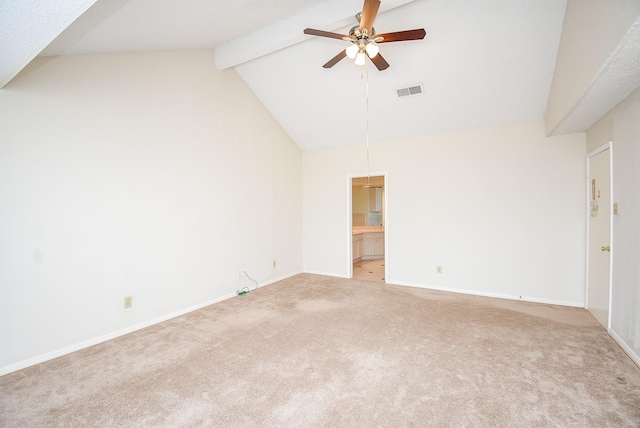 carpeted empty room with ceiling fan, beam ceiling, and high vaulted ceiling