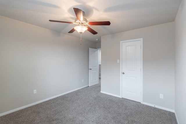 unfurnished bedroom featuring carpet flooring and ceiling fan