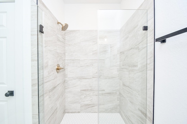 bathroom featuring an enclosed shower