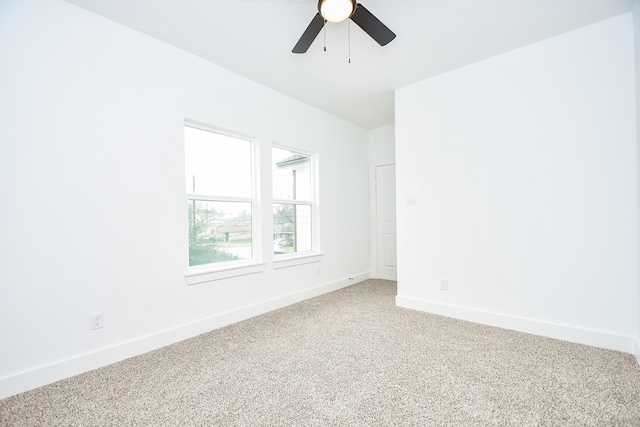 unfurnished room featuring carpet floors and ceiling fan