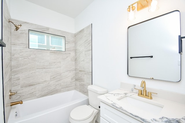 full bathroom featuring vanity, tiled shower / bath combo, and toilet