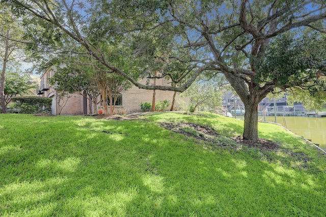 view of yard with a water view