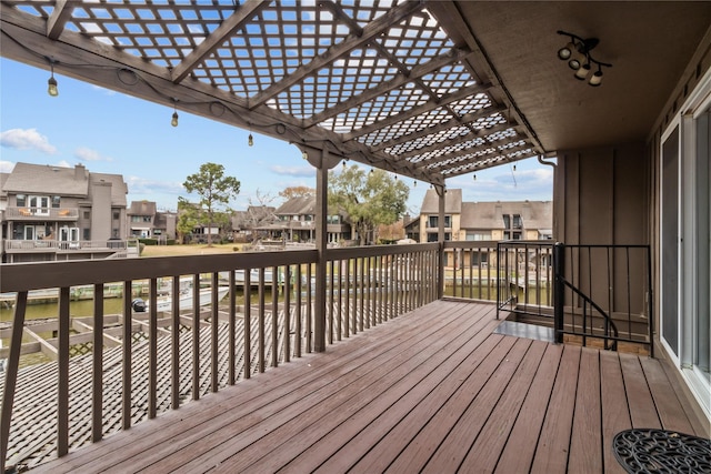 wooden deck featuring a pergola