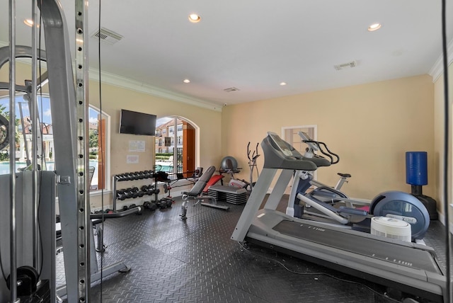 gym featuring ornamental molding