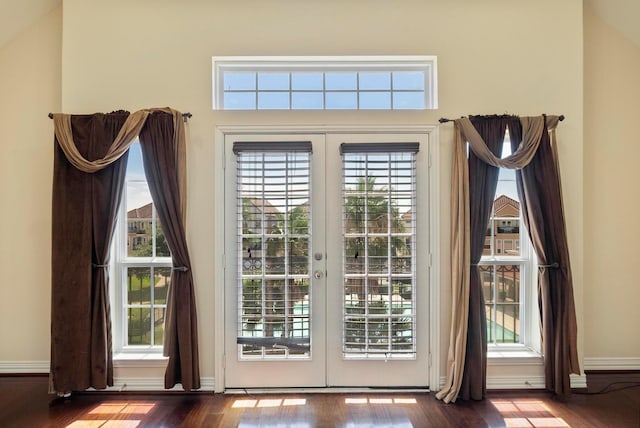 doorway to outside with french doors and hardwood / wood-style floors