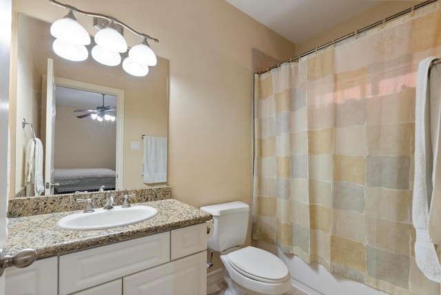 full bathroom with vanity, shower / bath combination with curtain, and toilet