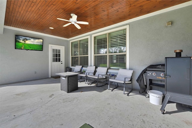 view of patio / terrace featuring ceiling fan