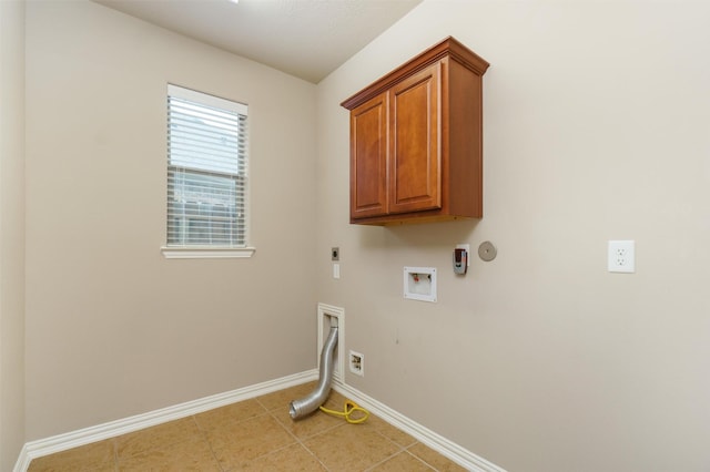 washroom with cabinets, washer hookup, light tile patterned floors, and electric dryer hookup