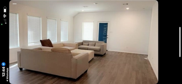 living room featuring dark hardwood / wood-style flooring