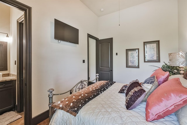 bedroom featuring ensuite bath