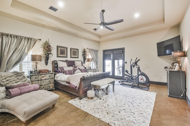 bedroom with baseboards, visible vents, a raised ceiling, ceiling fan, and access to exterior