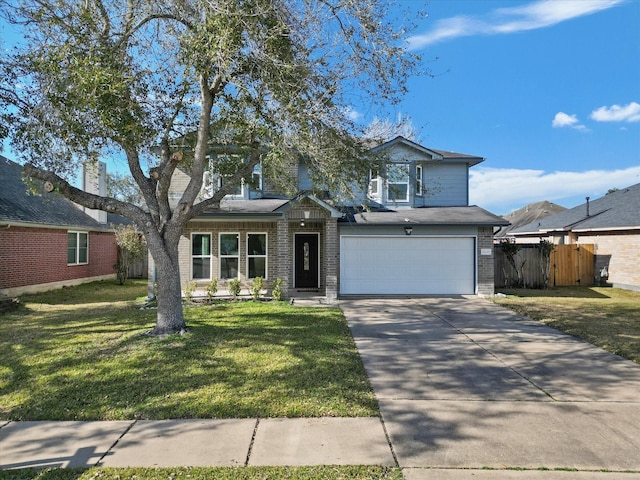 view of front of home featuring a garage and a front lawn