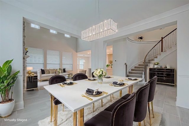 dining room with a high ceiling