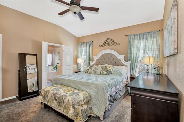 bedroom with lofted ceiling, carpet floors, ceiling fan, and ensuite bathroom