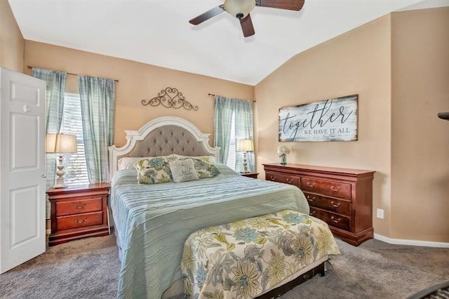 carpeted bedroom with multiple windows, lofted ceiling, and ceiling fan